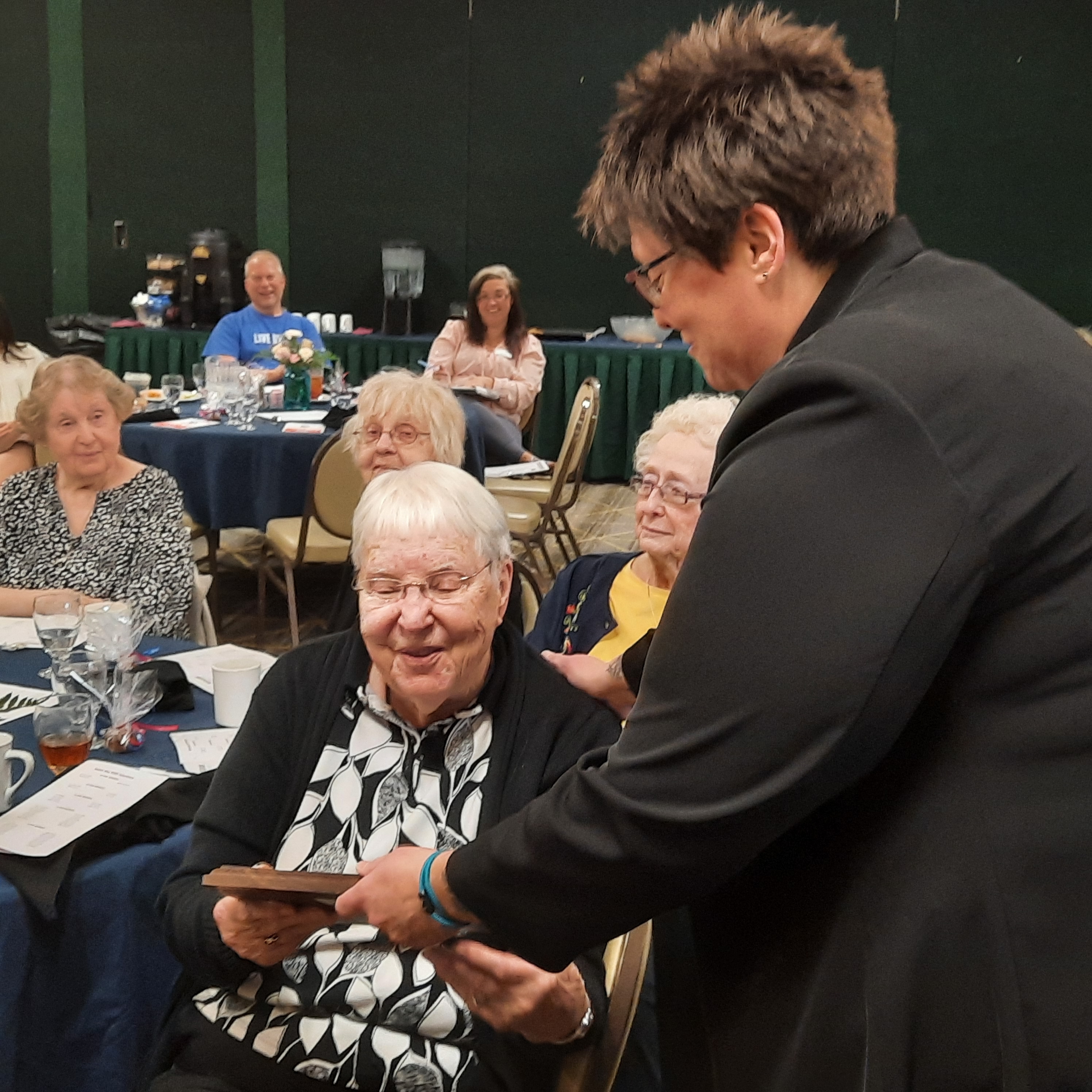 RSVP director recognizes a senior volunteer for 30 years of service